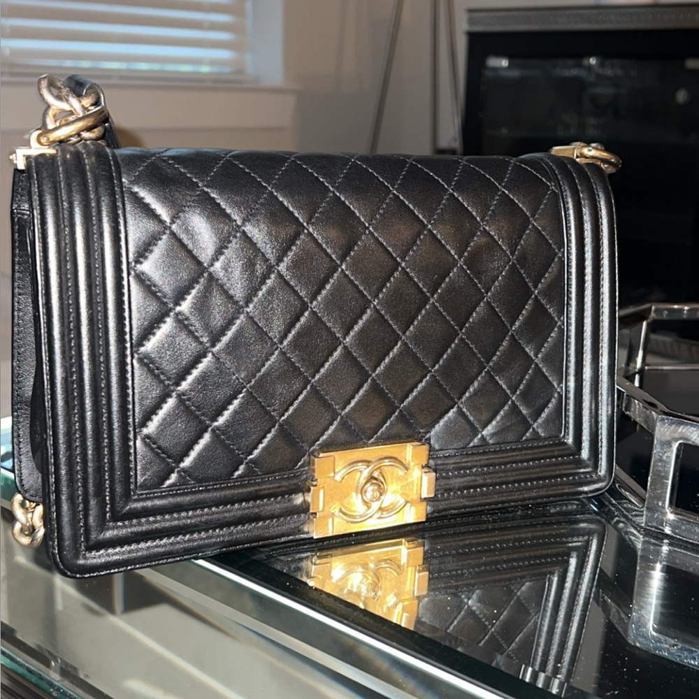 CHANEL Black Quilted Shoulder Bag with Gold Hardware
